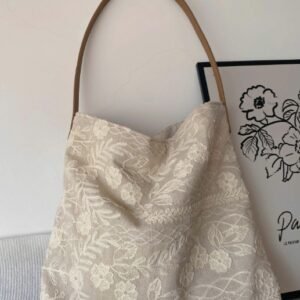 菜市場的貓原創亞麻花朵繡花單肩腋下包高級感小眾設計托特包清新